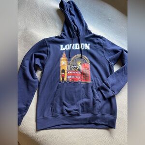 Blue Hooded Sweatshirt with London Logo. Size Large. Brand new without tags.